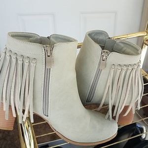 Fringed ankle high boots